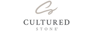 Logo of Cultured Stone with a stylized "CS" script above the words "Cultured Stone" in elegant serif typography.